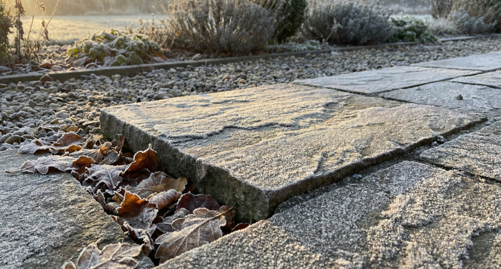 Winter frost highlights small patio defects that can worsen if left untreated.