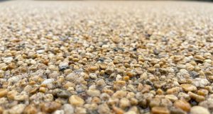 Close-up of a permeable resin bound driveway surface draining rainwater through the aggregate (2)